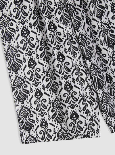 Pantaloni crop a palazzo con stampa geometrica