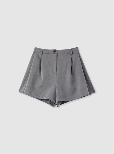 Shorts con pieghe a tinta unita