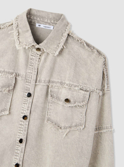 Shacket in denim con tasconi