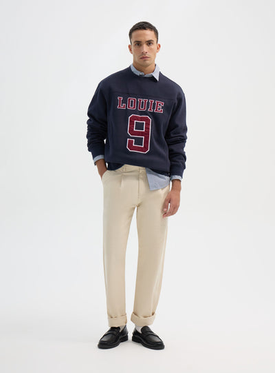 Pantaloni chino con pinces e gamba dritta