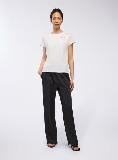T-shirt ampia con ricami floreali