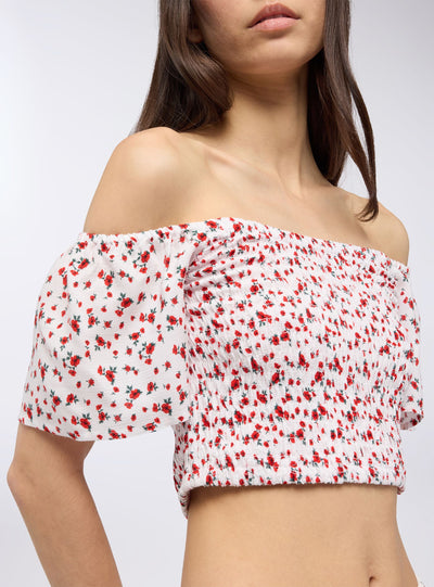 Blusa crop floreale in punto smock