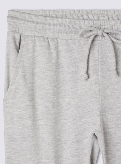 Pantaloni tuta pinocchietto con coulisse