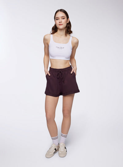 Shorts tuta a vita alta con risvolto