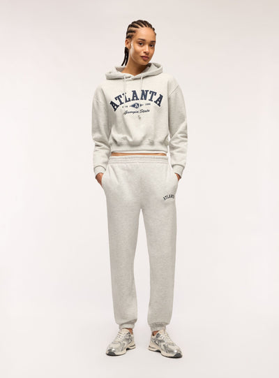 High-waisted sweatpants with college lettering