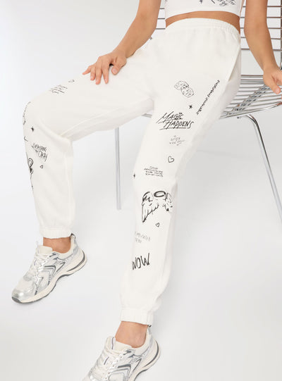 Pantaloni tuta con stampe graffiti