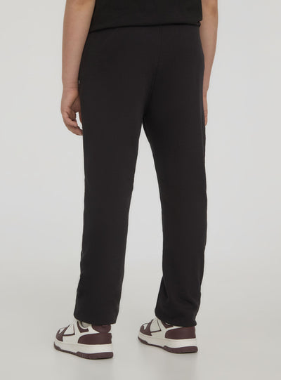 Pantalones ligeros de chándal con estampado deportivo