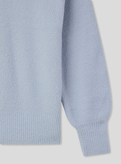 Maglia effetto pelo con maniche a palloncino
