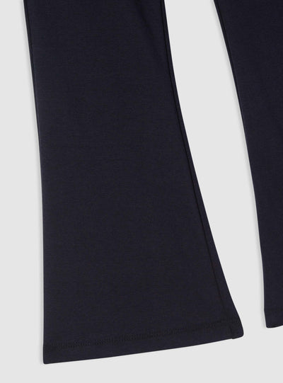 Pantaloni tuta a zampa con stampa college