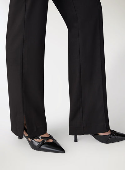 Pantaloni straight con spacco e nervatura