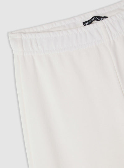 Pantaloni tuta flare vita bassa