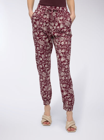 Jogger trousers with ramage pattern
