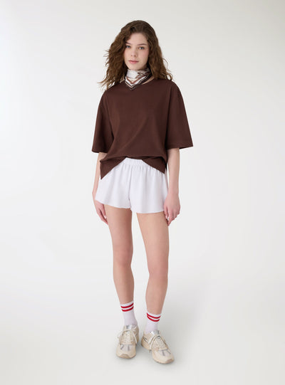 T-shirt over a tinta unita