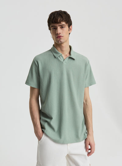 T-shirt polo a tinta unita effetto maglia