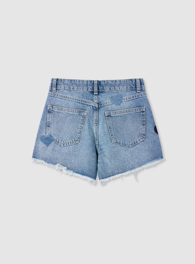 Shorts in denim con stampa cuori e borchie