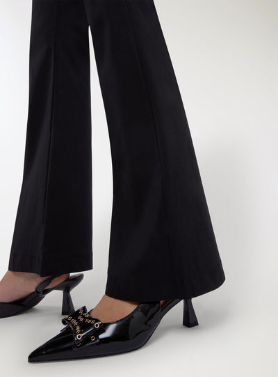 Pantaloni flare tinta unita