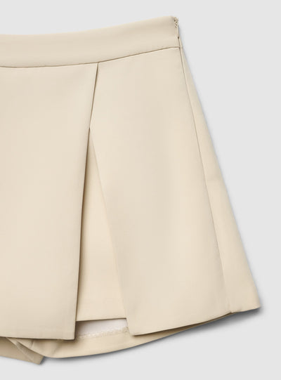 Asymmetric solid-colour skort