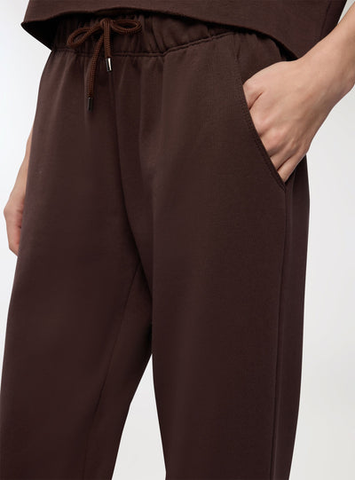 Pantaloni tuta a zampa vita bassa