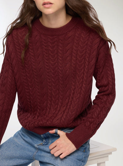 Maglia con lavorazione a trecce