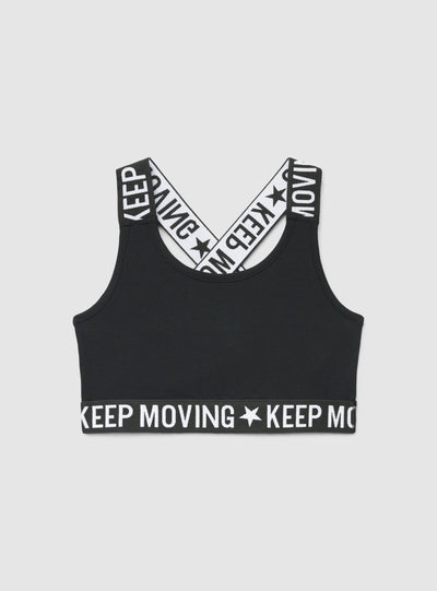 Top crop con spalline incrociate