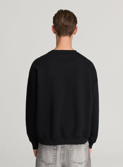 Felpa patch similpelle boxy fit