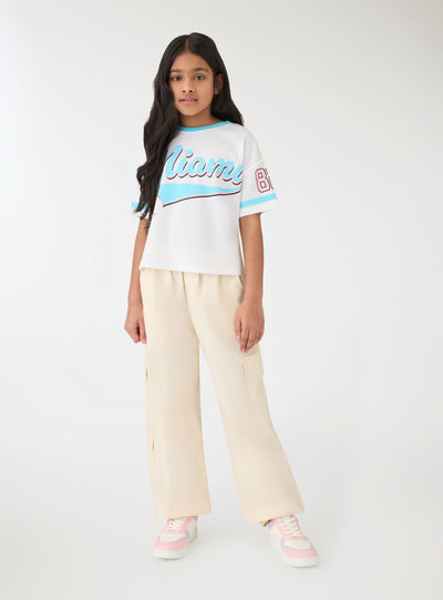 T-shirt con stampa college e profili a contrasto