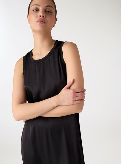 Vestito canotta ampia a tinta unita con spacco