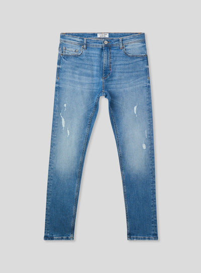 Jeans skinny con piccoli strappi