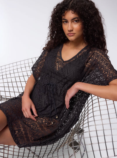 Vestito in pizzo semitrasparente