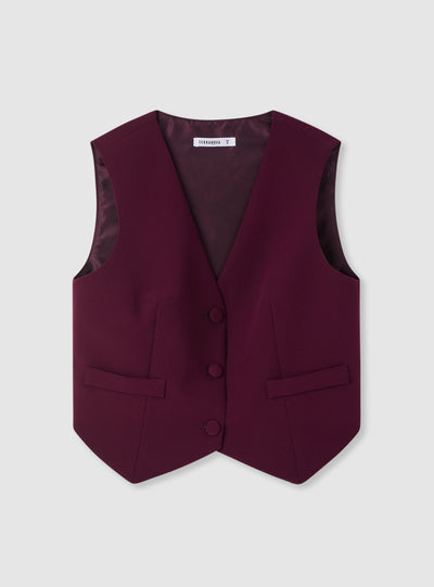 Gilet tinta unita con bottoni