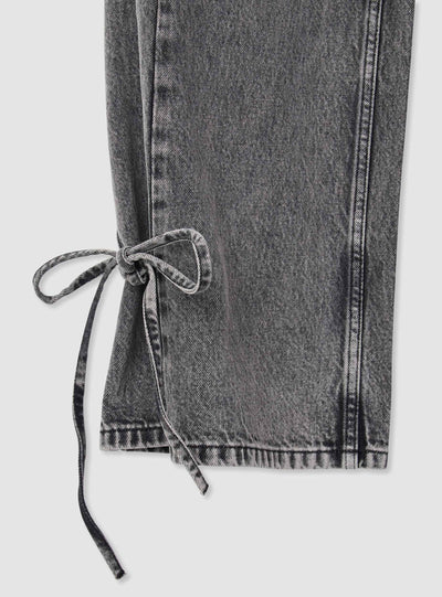 Jeans straight con lacci al fondo