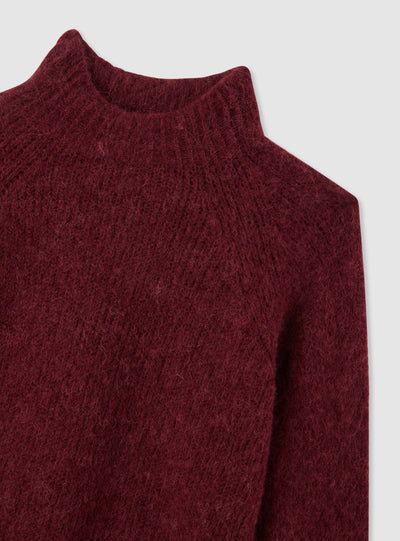 Maglia a tinta unita con collo alto