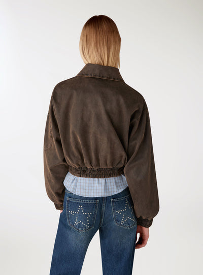 Bomber crop in denim lavato a tinta unita