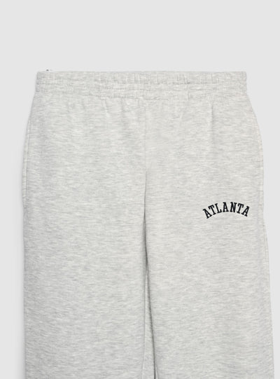 High-waisted sweatpants with college lettering