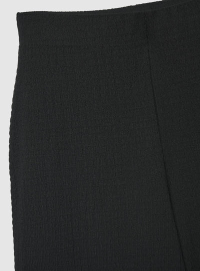 Pantaloni crop a tinta unita
