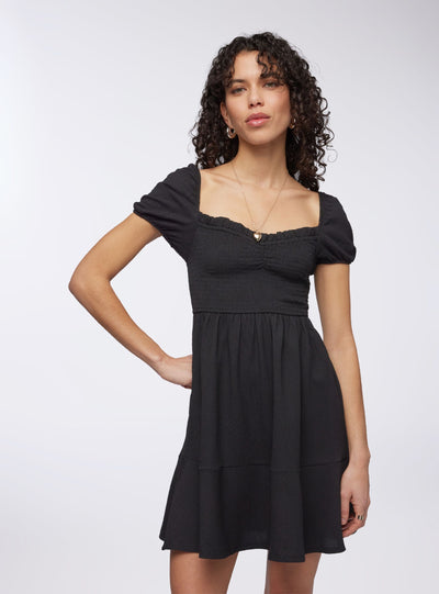 Vestito con punto smock tinta unita con scollo a cuore