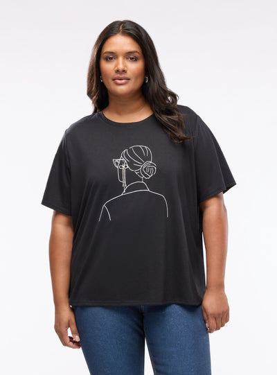 T-shirt con stampa grafica e applicazione
