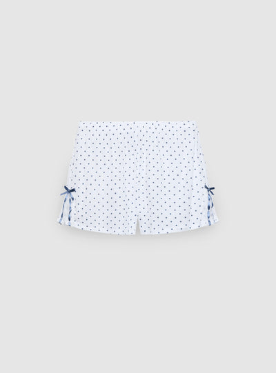 Pyjama set with spaghetti strap top and polka dot shorts