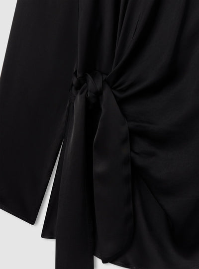Blusa con nodo laterale
