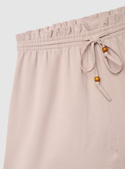 Shorts morbidi a tinta unita con coulisse