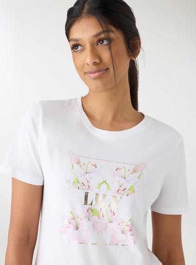 T-shirt con stampa fiori e scritta