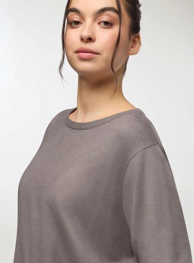 Maglia con bottoni nei polsini