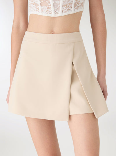 Asymmetric solid-colour skort