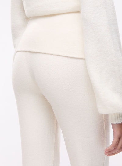 Leggings lunghi a zampa con baschina