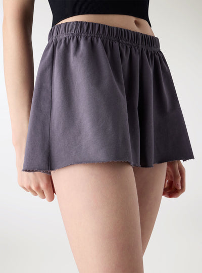 Pantaloncini tuta corti svasati a tinta unita