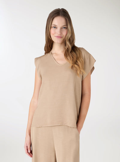 Blusa con scollo a V e maniche ad aletta