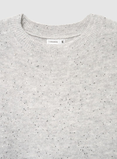 Top with shimmering effect and sequins