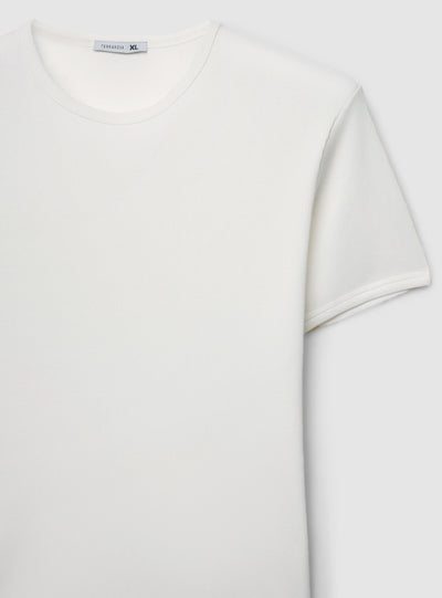 T-shirt a costine aderente a tinta unita