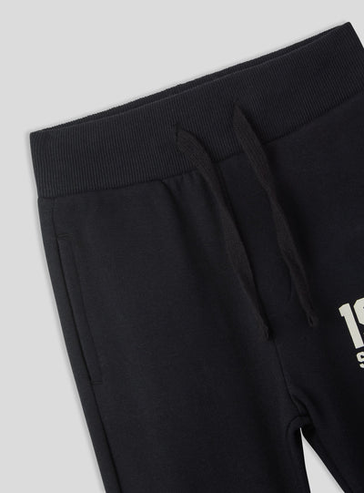 Pantalones ligeros de chándal con estampado deportivo