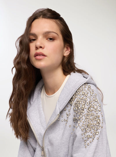 Sweat à capuche zippé avec strass